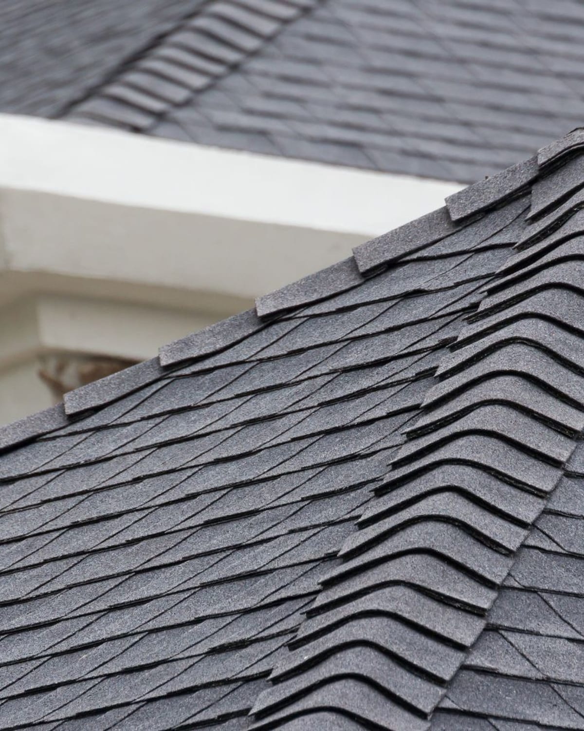 Ridge and hip cap detail on a residential asphalt shingle roof