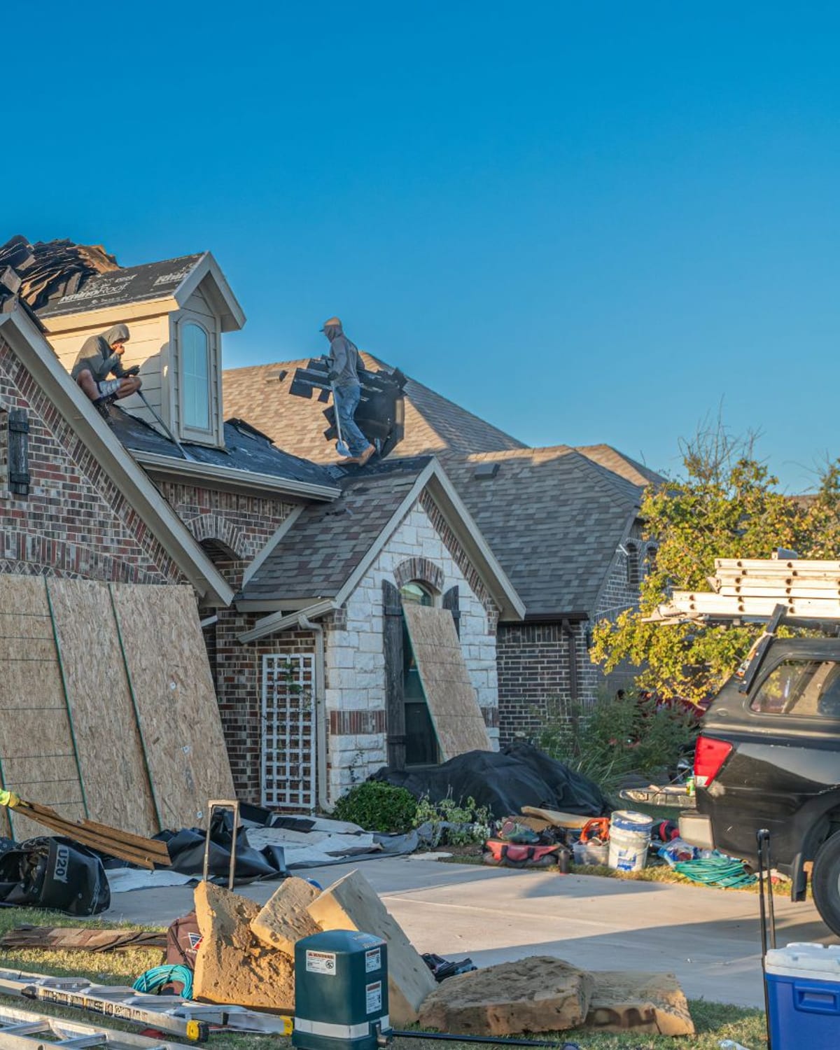 Golden Roofing crew working a tear-off on a home near Myrtle Beach, SC